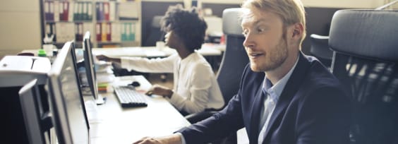 people sitting in front of computers